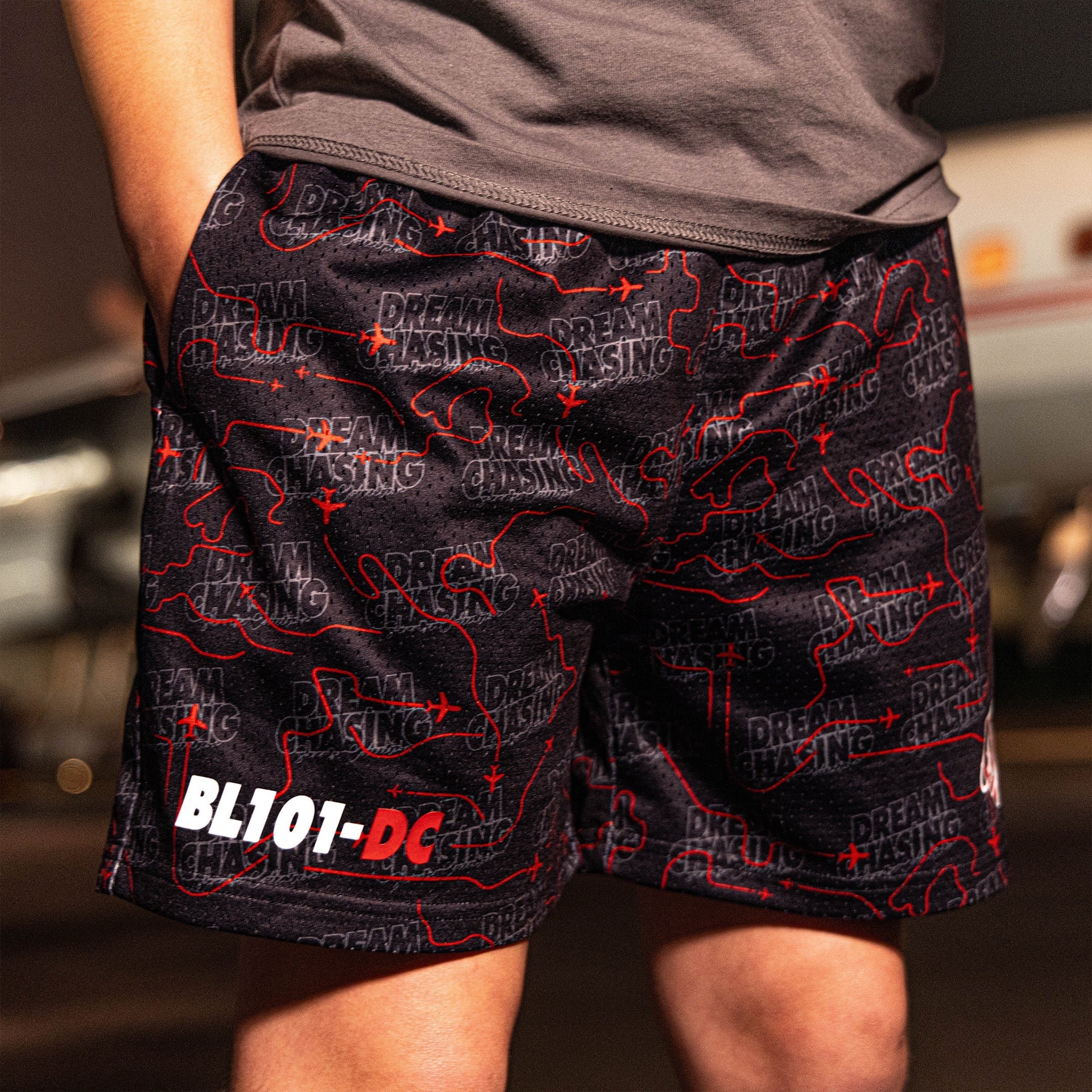 Dream Chaser Shorts - Red Eye Black Print Mesh Athletic Shorts with Red Waistband